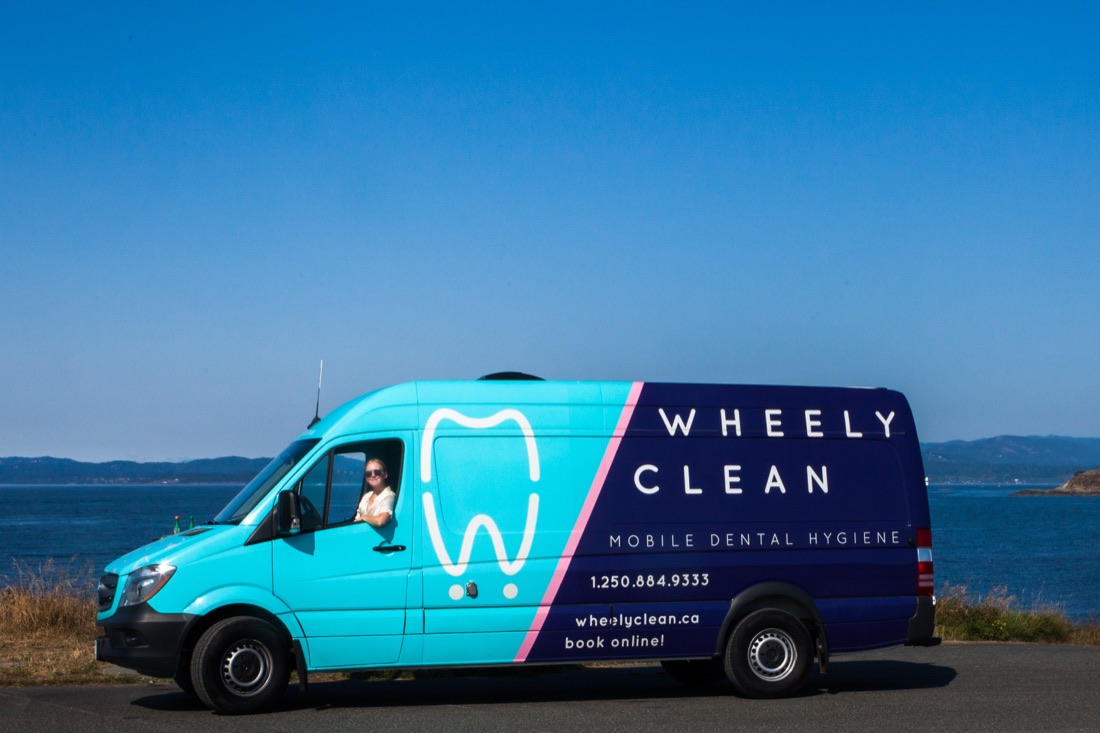 A Wheely Clean van parked at a Victoria waterfront lookout